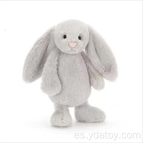 Linda muñeca de conejo gris lujoso
